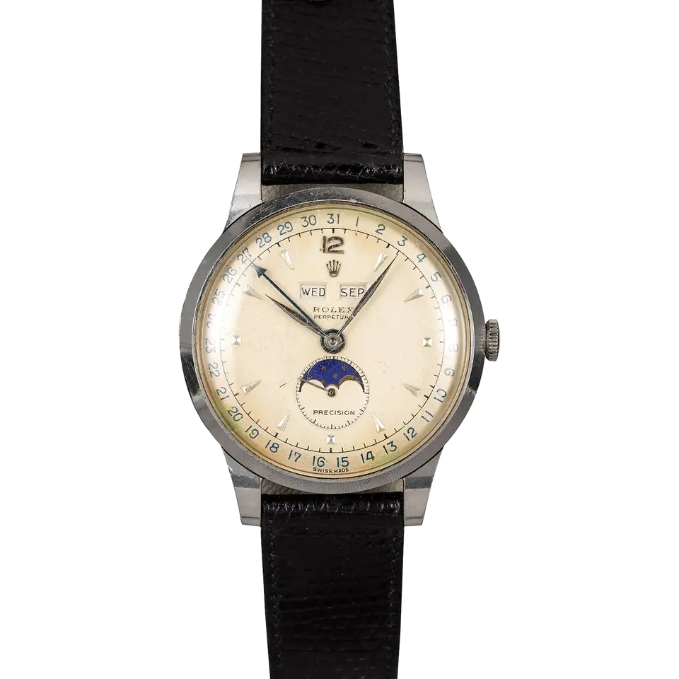 Rolex Triple Calendar Moonphase 8171 with a cream triple-calendar dial with moon phase and pointer date, steel case on a black leather strap, a pre-owned example, front view of the whole watch