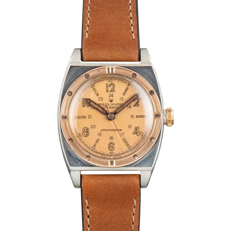 Rolex Viceroy 3359 with a salmon 24-hour Arabic-numeral dial, engraved gold bezel and steel and gold case on a tan leather strap, a pre-owned example, front view of the whole watch