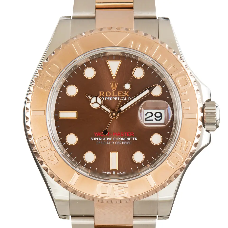 Rolex Yacht-Master 40 126621 with a chocolate dial and an Everose gold bezel with raised numerals, a pre-owned example, studio close-up of the case