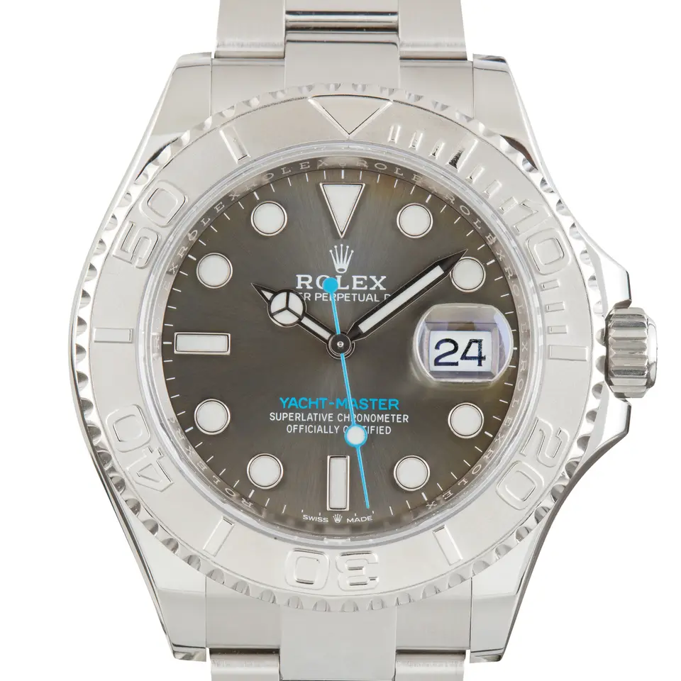 Rolex Yacht-Master 40 126622 with a slate dial and a platinum bezel with raised numerals, a pre-owned example, studio close-up of the case