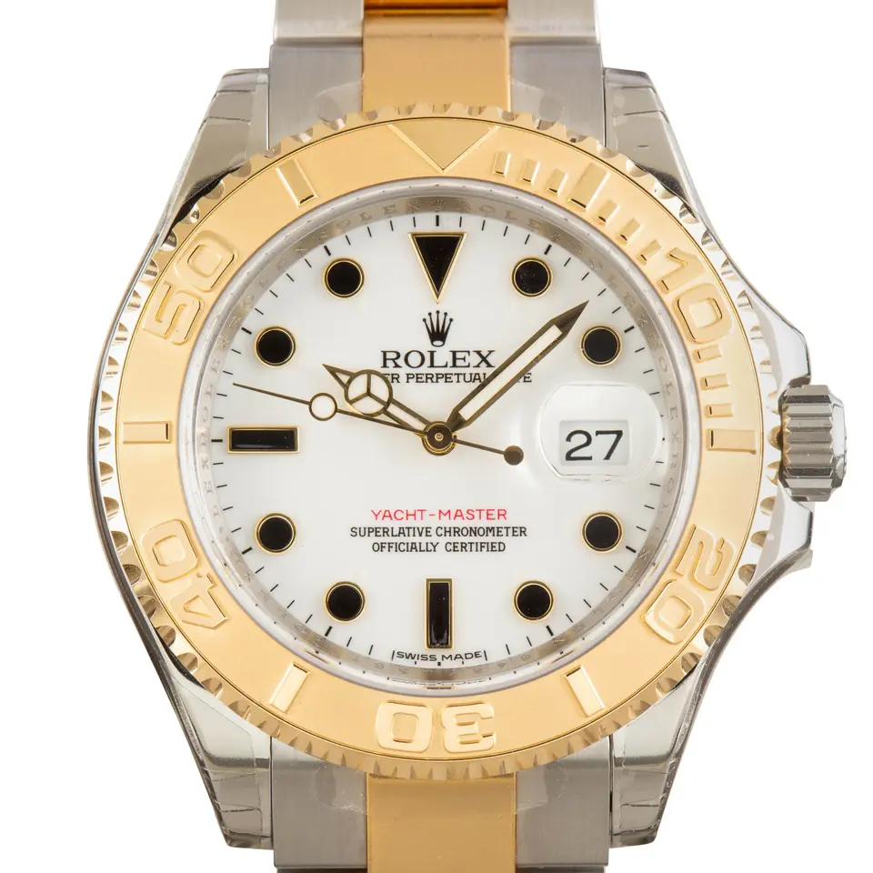 Rolex Yacht-Master 16623 with a white dial and yellow gold bezel in steel and yellow gold on an Oyster bracelet, a pre-owned example, studio close-up of the case