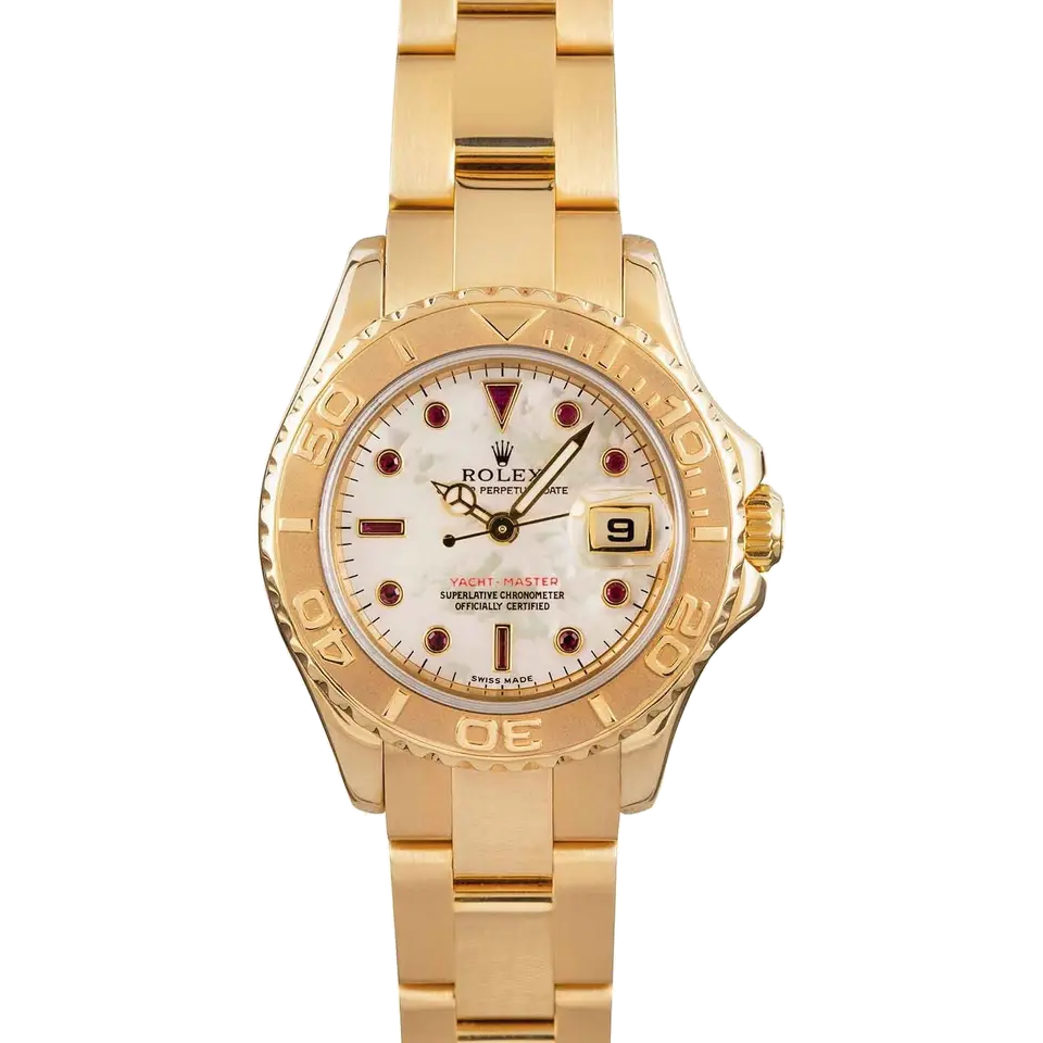 Rolex Yacht-Master 169628 with a mother-of-pearl dial with ruby markers, yellow gold rotating bezel and yellow gold Oyster bracelet, a pre-owned example, front view of the whole watch