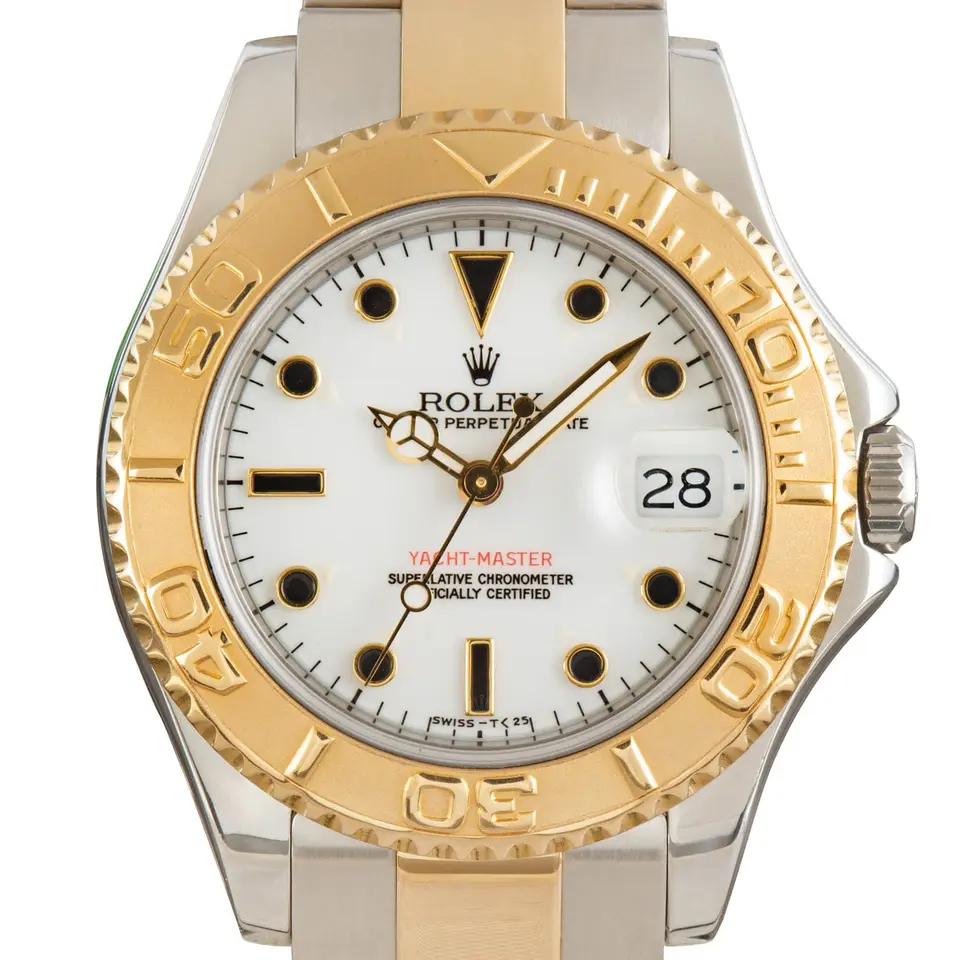 Rolex Yacht-Master 68623 with a white dial and yellow gold bezel in steel and yellow gold on an Oyster bracelet, a pre-owned example, studio close-up of the case
