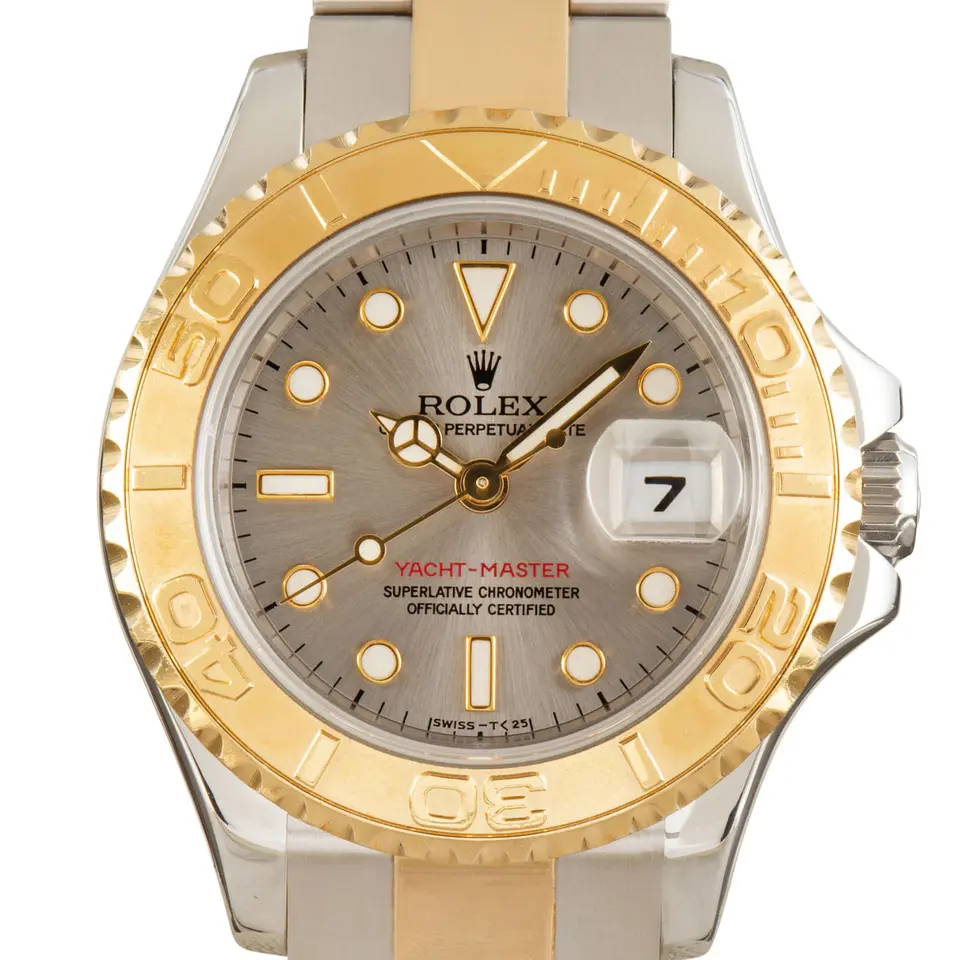 Rolex Yacht-Master 29 69623 with a slate dial, yellow gold rotating bezel and steel and gold Oyster bracelet, a pre-owned example, studio close-up of the case
