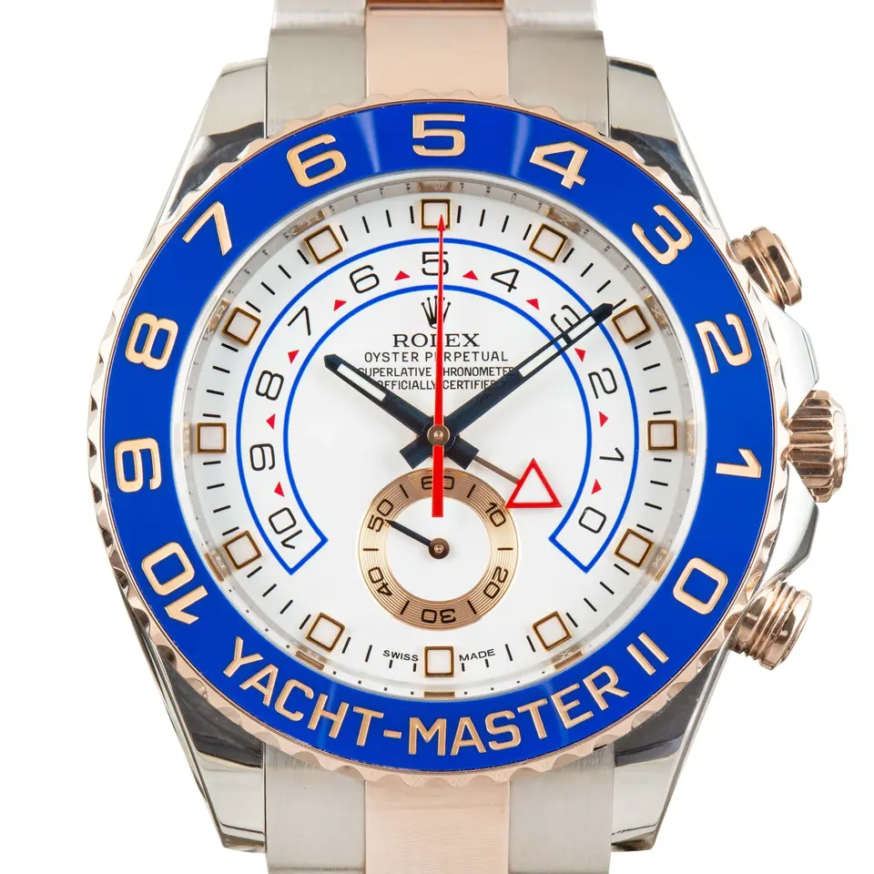 Rolex Yacht-Master II 116681 with a white dial and blue ceramic regatta bezel in steel and Everose gold on an Oyster bracelet, a pre-owned example, studio close-up of the case